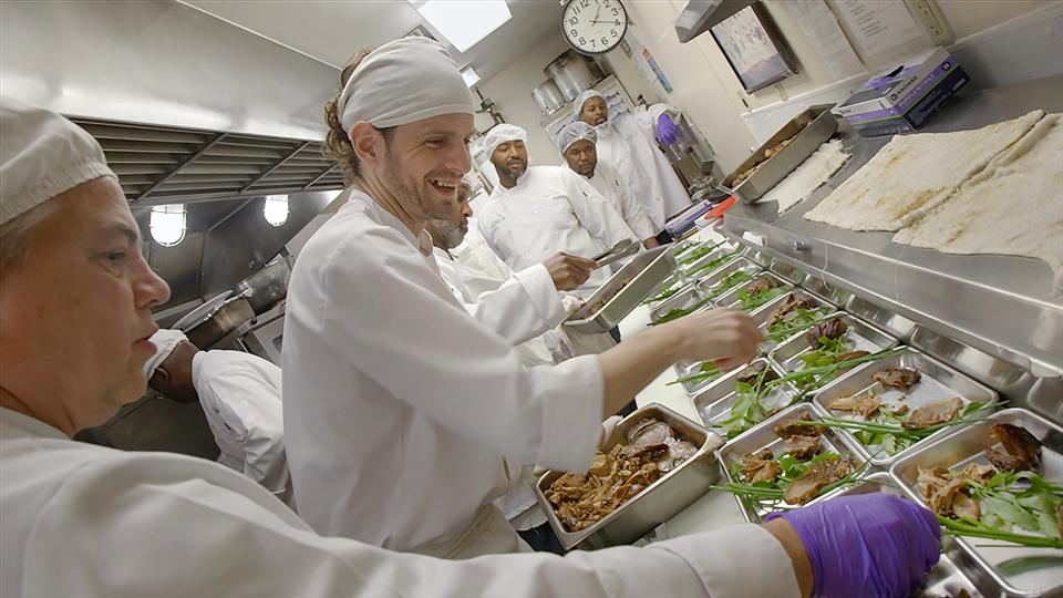 Brad Leonard prepares a multi-course meal at Lakeland Correctional Facility in Coldwater, Mich. Leonard is a student in the food tech program, a unique culinary class designed to teach inmates the intricacies of fine dining.