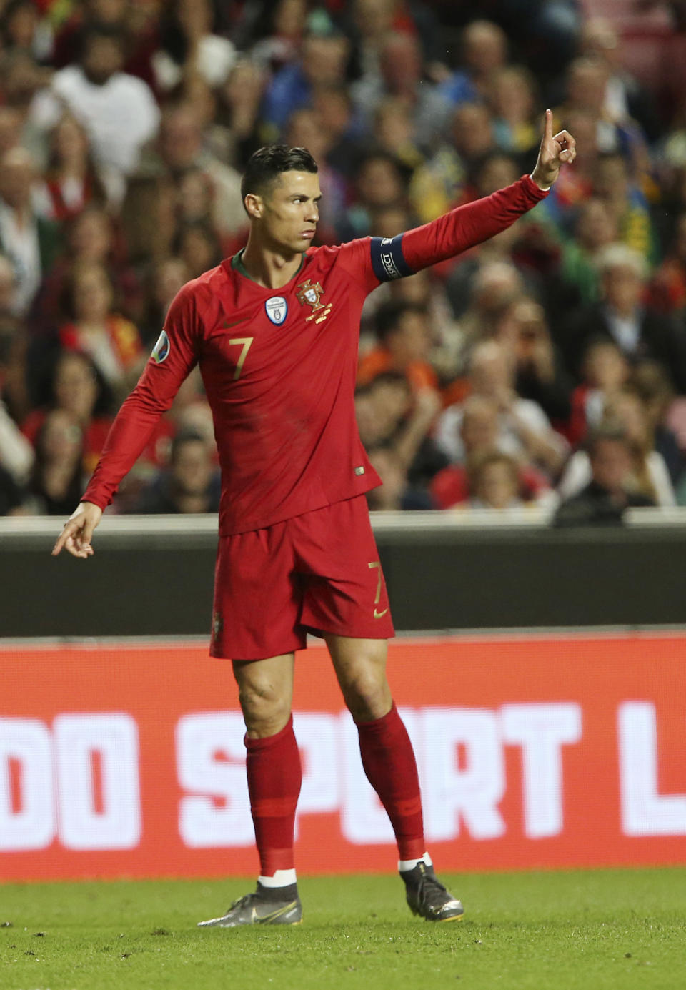 Portugal's Cristiano Ronaldo gestures during the Euro 2020 group B qualifying soccer match between Portugal and Ukraine at the Luz stadium in Lisbon, Friday, March 22, 2019. (AP Photo/Armando Franca)