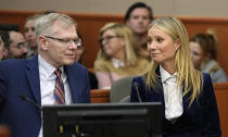 FILE - Gwyneth Paltrow, right, and her attorney Steve Owens react after the verdict was read on March 30, 2023, in Park City, Utah, in a lawsuit, over a 2016 ski collision at a posh Utah ski resort. A jury decided that Paltrow wasn't at fault for the collision with retired optometrist Terry Sanderson. (AP Photo/Rick Bowmer, File)