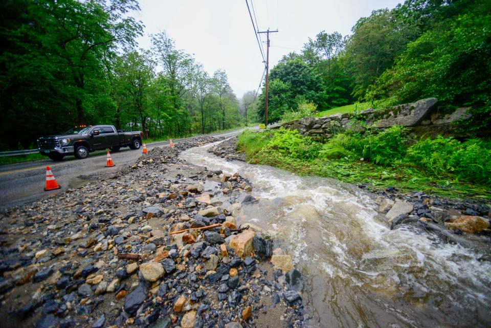 Heavy rain caused part of Route 30 in Jamaica, VT., to washout on Monday, July 10, 2023. (Kristopher Radder/The Brattleboro Reformer via AP)