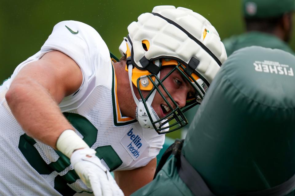 Green Bay Packers linebacker Lukas Van Ness (90) participates in drills during a joint practice between the Green Bay Packers and the Cincinnati Bengals, Wednesday, Aug. 9, 2023, at the practice fields next to Paycor Stadium in Cincinnati.