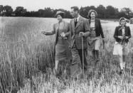 <p>Queen Elizabeth leads King George VI, and Princesses Elizabeth and Margaret around Sandringham Park, which was turned over to agricultural production to assist the war effort. </p>