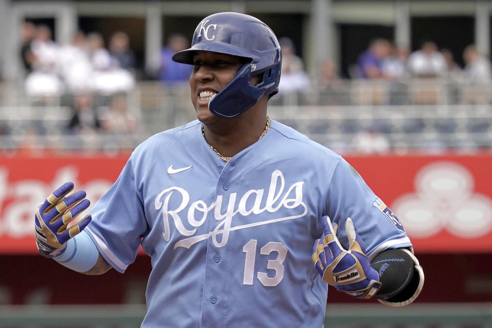 Kansas City Royals' Salvador Perez celebrates on first after hitting an RBI single during the third inning of a baseball game against the Minnesota Twins Thursday, Sept. 22, 2022, in Kansas City, Mo. (AP Photo/Charlie Riedel)