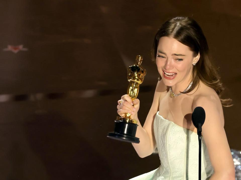Emma Stone accepts the Best Actress in a Leading Role award for “Poor Things” at the 2024 Oscars. Getty Images