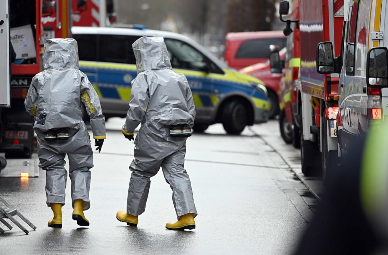 Special police forces in protective suits conduct search operations on properties linked to an Iranian national, a day after the man, 32, and his brother were detained on suspicion of planning a poison attack, January 9, 2023, in   Castrop-Rauxel, North Rhine-Westphalia state, Germany. / Credit: Bernd Thissen/picture alliance/Getty