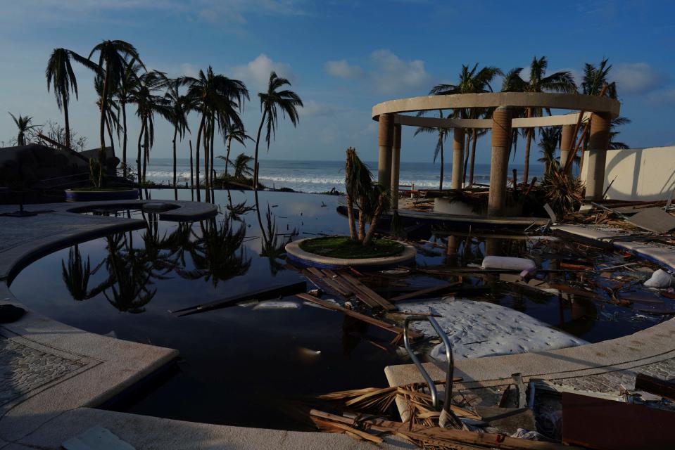 A view of the beach seen from inside a damaged hote (REUTERS)