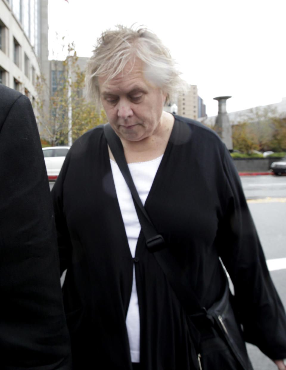 Former Democratic campaign treasurer Kinde Durkee leaves the federal courthouse in Sacramento, Calif., after she was sentenced to more than eight years in federal prison for defrauding high-profile clients, such as U.S. Sen. Dianne Feinstein, Wednesday, Nov. 28, 2012. Durkee, who pleaded guilty to five counts of mail fraud in March, was sentenced to a total of 97 months and was ordered to pay $10.5 million in restitution for tampering with the electoral process. (AP Photo/Rich Pedroncelli)