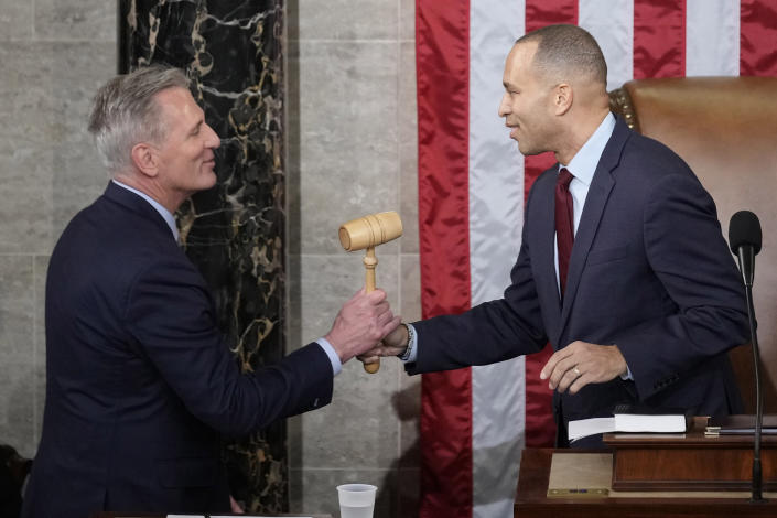 Incoming House Speaker Kevin McCarthy of Calif., receives the gavel from House Minority Leader Hakeem Jeffries of N.Y., on the House floor at the U.S. Capitol in Washington, early Saturday, Jan. 7, 2023. (AP Photo/Andrew Harnik)