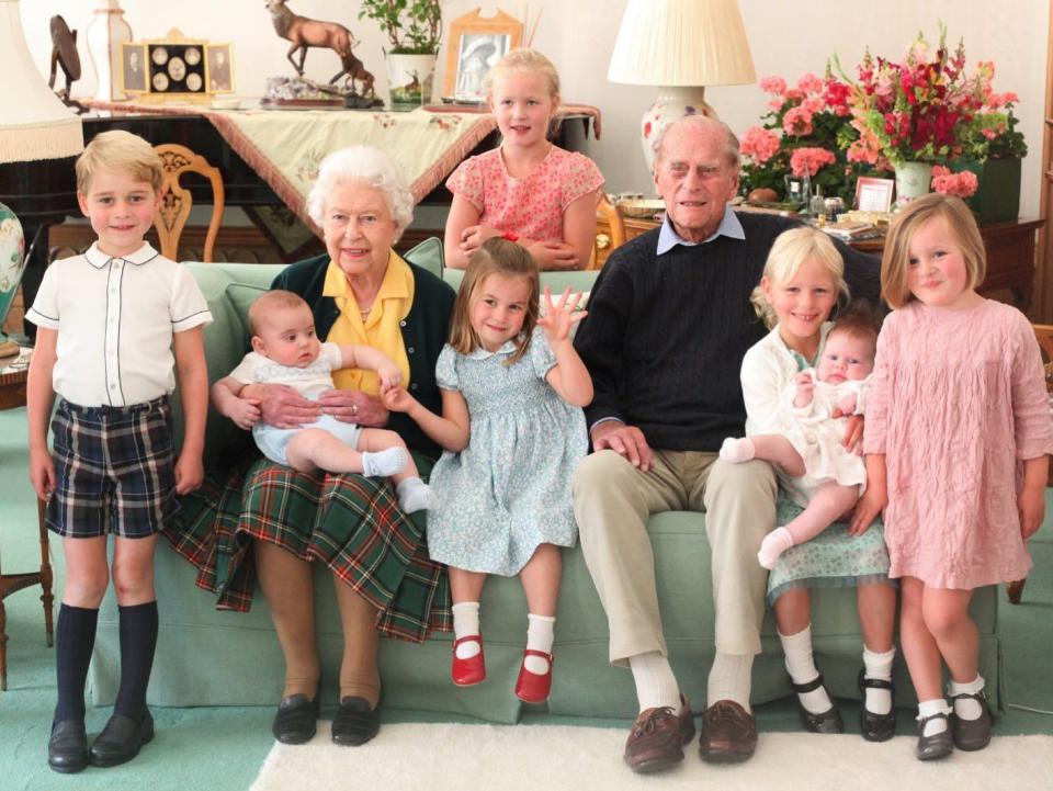 <p>While this photo of Prince Philip, the Queen, and several of their great grandchildren was taken by the Duchess of Cambridge back in 2018, it was only shared with the public after the Duke of Edinburgh's passing. </p><p><a class="link " href="https://www.townandcountrymag.com/society/tradition/a36121727/queen-elizabeth-prince-philip-death-great-grandchildren-photos/" rel="nofollow noopener" target="_blank" data-ylk="slk:Read the story behind the photo.;elm:context_link;itc:0;sec:content-canvas">Read the story behind the photo.</a></p>