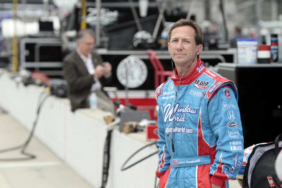 FILE - In this May 19, 2010, file photo, John Andretti watches during practice for the Indianapolis 500 auto race at the Indianapolis Motor Speedway in Indianapolis. Andretti, a member of one of racing's most families, has died following a battle with colon cancer, Andretti Autosports announced Wednesday, Jan. 30, 2020. He was 56. (AP Photo/AJ Mast, File)