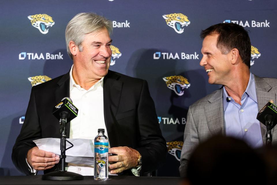 Doug Pederson talks with Trent Baalke, General Manager of the Jacksonville Jaguars, during a press conference introducing him as the new Head Coach of the Jacksonville Jaguars at TIAA Bank Stadium on February 05, 2022 in Jacksonville, Florida.