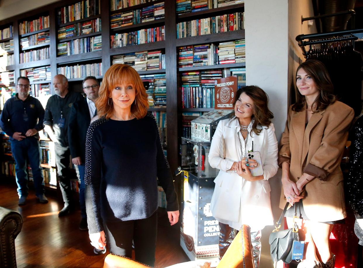 Reba McEntire talks with guests during the Jan. 26, 2023, grand opening of Reba's Place in Atoka.