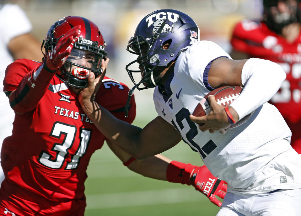 TCU’s Shawn Robinson (R) is set to be the team’s starting quarterback in 2018. He started against Texas Tech in 2017. (AP Photo/Brad Tollefson, File)