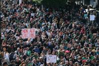 Demonstrators shout slogans during a protest to reject the presidential election in Algiers,
