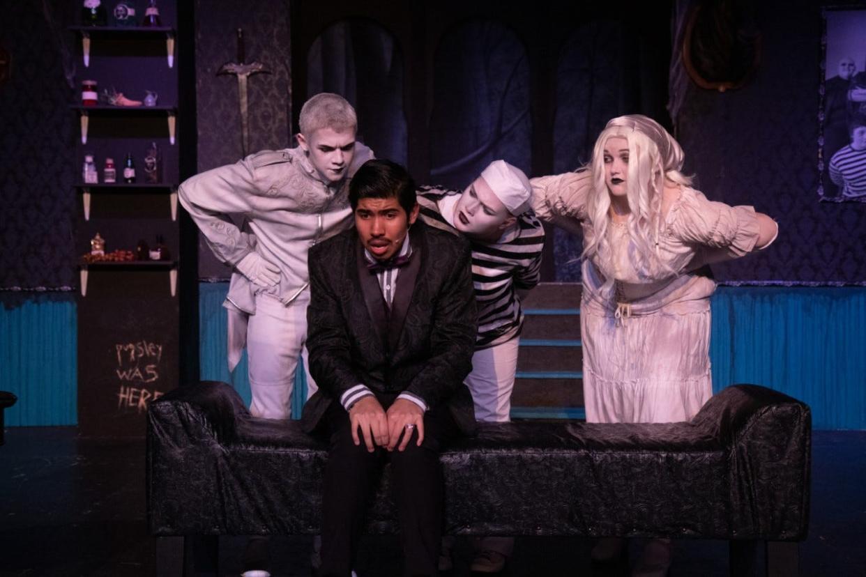 Pueblo County High School students Jack Hancock, Mark Gomez, Malla Ylipahkala and Sarah Paul during a performance of "The Addams Family: A Musical Comedy."