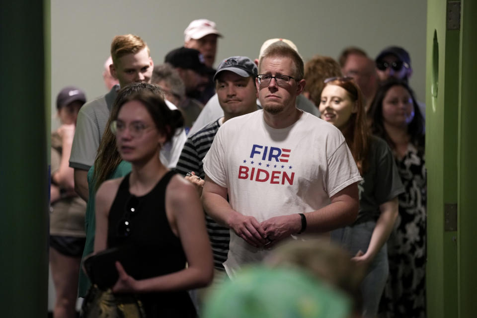 Local residents wait so sign their names to help Independent Presidential candidate Robert F. Kennedy, Jr. gain access to the Iowa ballot during a campaign event, Saturday, April 13, 2024, in West Des Moines, Iowa. (AP Photo/Charlie Neibergall)