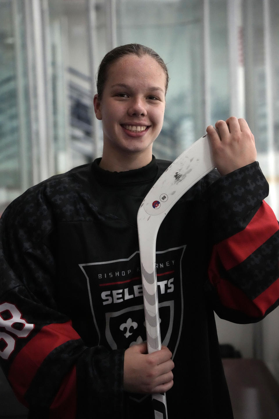 Bishop Kearney Selects Under-19 girls team winger Nela Lopusanova poses for a photo following a hockey game in a Labor Day Weekend tournament in Pittsburgh, Friday, Sept. 1, 2023. (AP Photo/Gene J. Puskar)