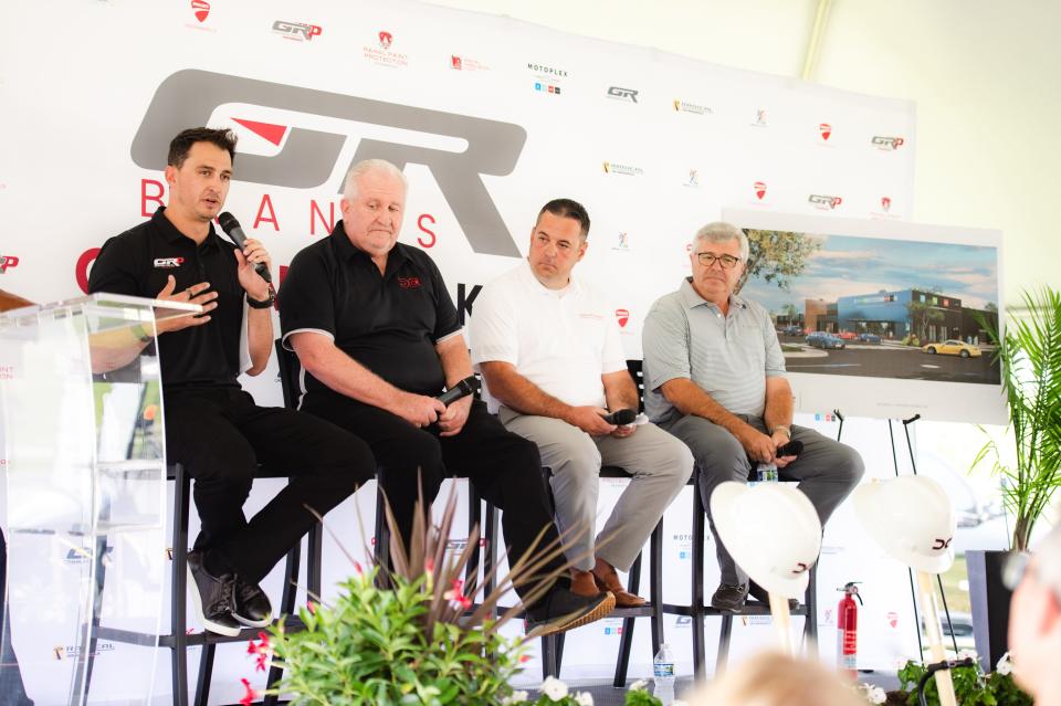 Graham Rahal (pictured level), the owner of his Graham Rahal Brands company that includes Ducati and Piaggio dealerships and a high-performance car restoration shop, speaks Wednesday and the groundbreaking ceremony for GRB's new headquarters in Zionsville.