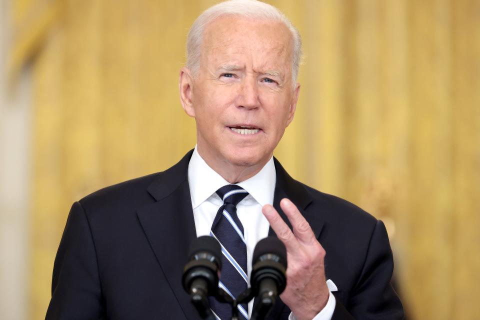 President Joe Biden gestures as he delivers remarks on the COVID-19 response and the vaccination program in the East Room of the White House on Aug. 18, 2021. During his remarks, Biden announced that he is ordering the Department of Health and Human Services to require nursing homes to have vaccinated staff in order to receive Medicare and Medicaid funding.