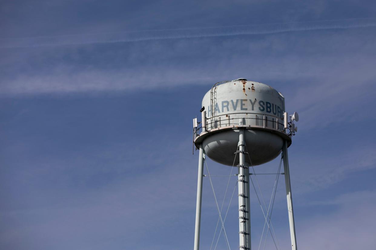 his blue water tower overlooks the small village of Harveysburg, Ohio,