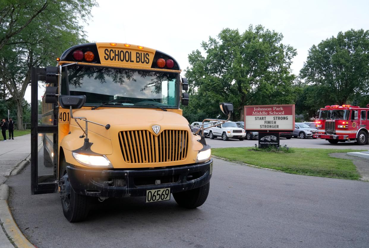 A school bus rolls up to drop students off at Johnson Park Middle School on the first day of school for the Columbus City Schools district on Wednesday.