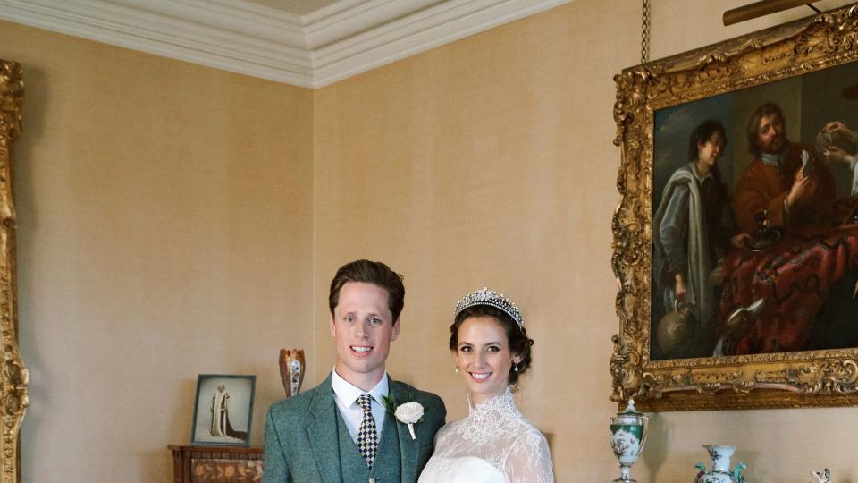 a man and woman in formal wear