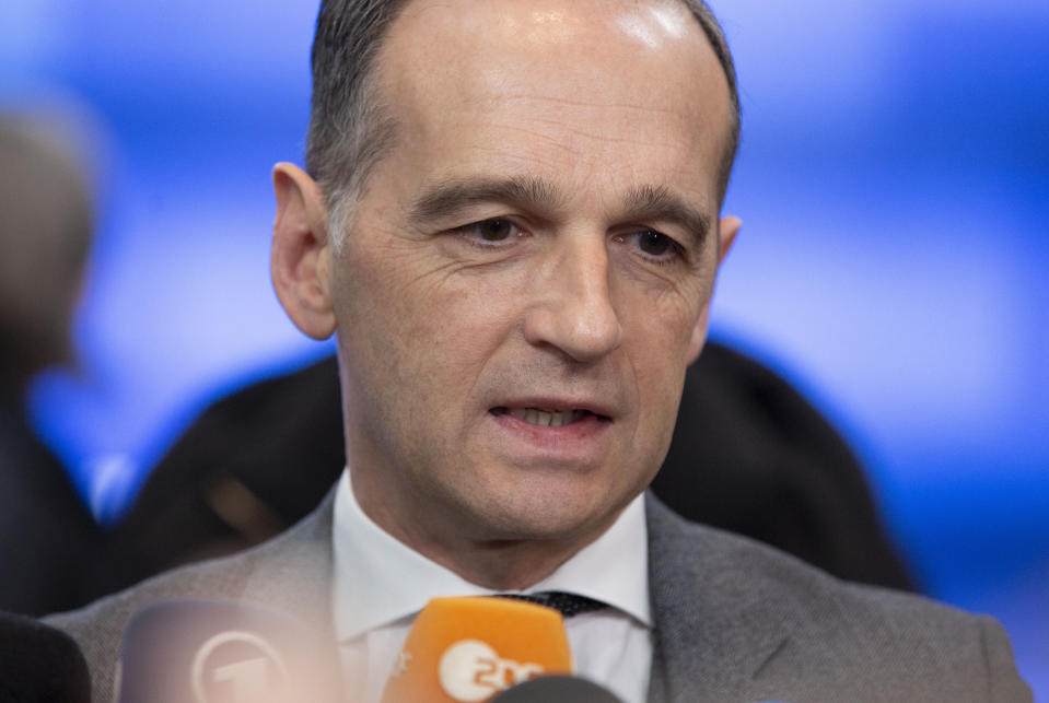 German Foreign Minister Heiko Maas arrives for a meeting of EU foreign ministers at the Europa building in Brussels, Monday, Jan. 20, 2020. EU foreign ministers meet in Brussels on Monday to discuss the situation in Libya and Venezuela, the deteriorating security and humanitarian situation in Sahel, and climate diplomacy. (AP Photo/Virginia Mayo)