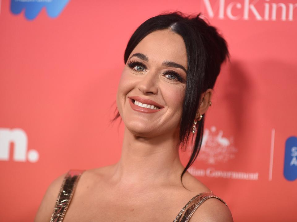 Katy Perry breaks down in tears and shouts that the US has 'failed us