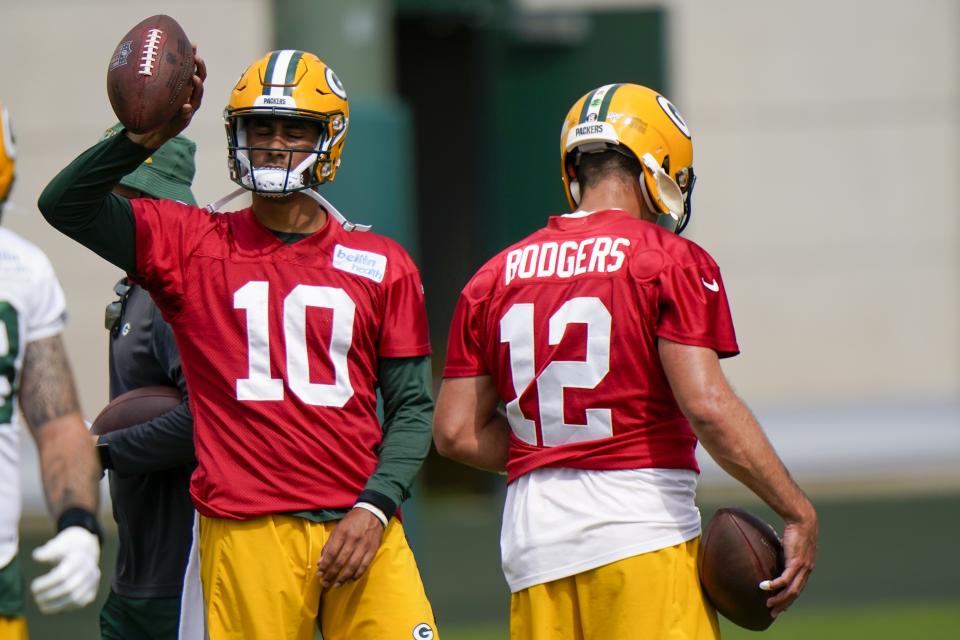 Green Bay Packers' Aaron Rodgers and Jordan Love are seen during NFL football training camp Saturday, Aug. 15, 2020, in Green Bay, Wis. (AP Photo/Morry Gash)