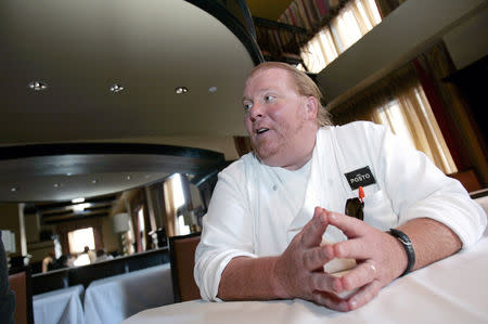 Celebrity chef Mario Batali talks during an interview with Reuters at his restaurant, Del Posto, in New York, U.S., April 11, 2006. REUTERS/Brendan McDermid/File Photo