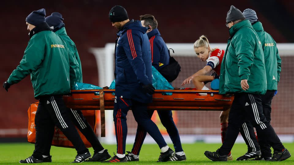 Vivianne Miedema is consoled by her Arsenal teammate Leah Williamson after suffering an ACL injury in December. - Andrew Couldridge/Action Images/Reuters