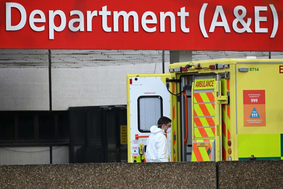 Medical personnel wear personal protective equipment: Getty Images