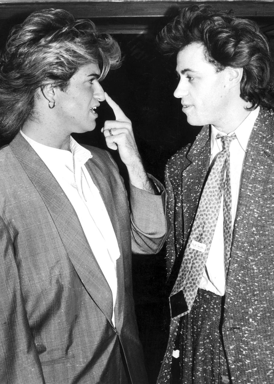 UNITED KINGDOM - MAY 30:  George Michael and Bob Geldof, 1985. Michaels partner Andrew Ridgeley had a nose-job.  (Photo by Manchester Daily Express/SSPL/Getty Images)