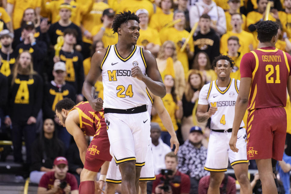 Missouri's Kobe Brown smiles as he runs up court during the second half of an NCAA college basketball game against Iowa State, Saturday, Jan. 28, 2023, in Columbia, Mo. Missouri won 78-61.(AP Photo/L.G. Patterson)