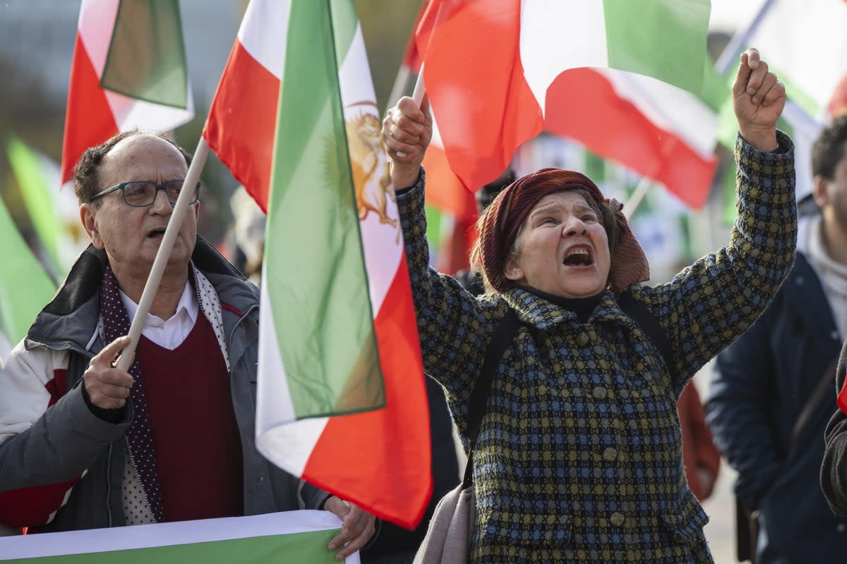 Iranians stage a protest in front of the European headquarters of the UN  in Geneva during a Human Rights Council’s special session (EPA)