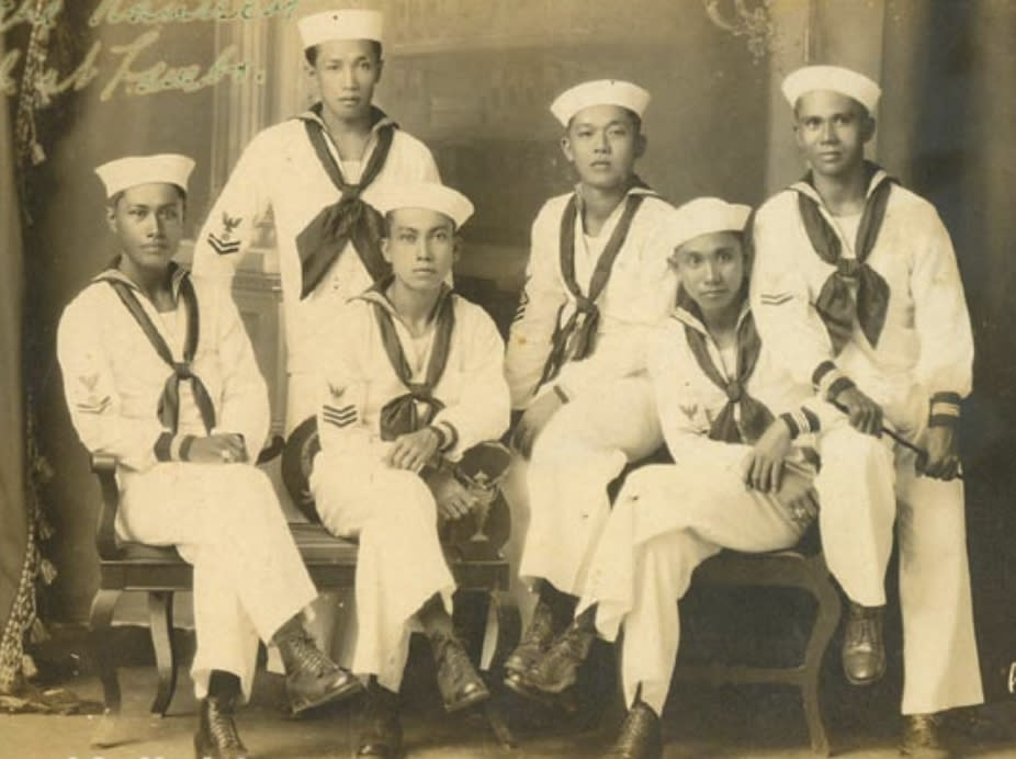 In this 1923 photo provided by the Filipino American National Historic Society are Filipino sailors in an unknown location. Asians Americans, veterans and civilians in the U.S. and the Philippines are campaigning to name a Navy warship for a Filipino sailor who bravely rescued two crew members when their ship caught fire more than century ago, earning him a prestigious and rare Medal of Honor. (Filipino American National Historic Society via AP)