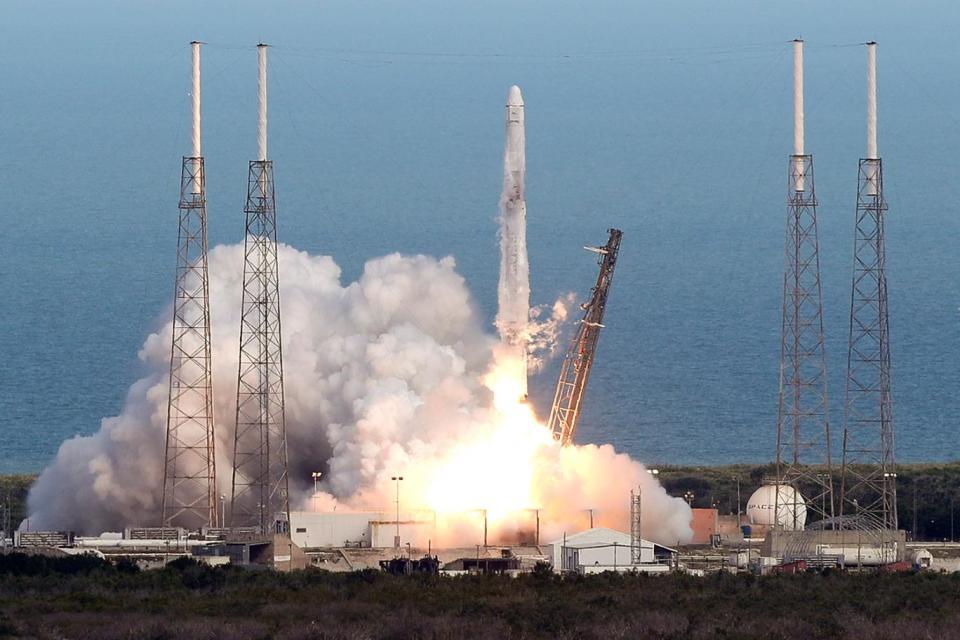 A rocket owned by private space firm SpaceX blasts off from its launch pad in Florida (file image) (John Raoux/AP)