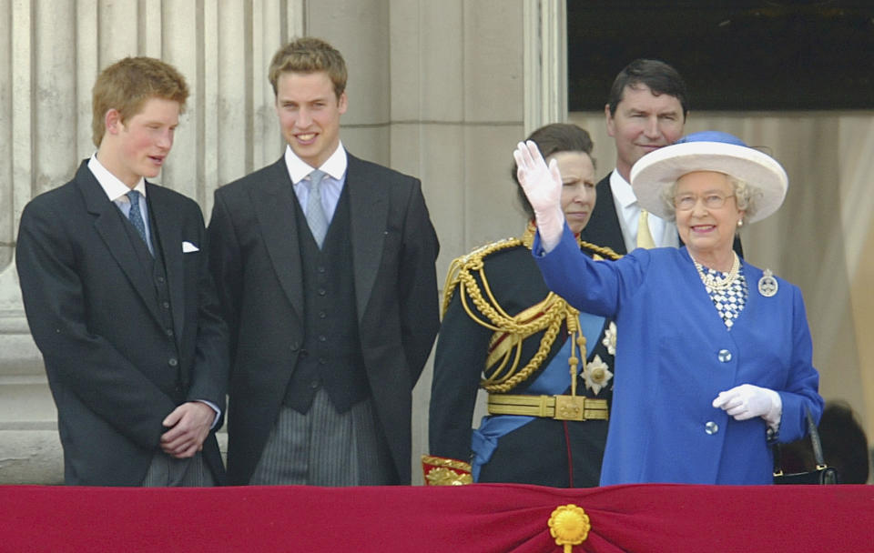 <p>The Queen waves to onlookers as the young princes Harry and William join her and Princess Anne and Sir Timothy Laurence for Trooping the Colour. (Getty)</p> 