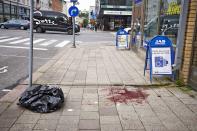 <p>Blood stains remain on the sidewalk at the site of one of the multiple stabbings, on Puutori Square in Turku, Finland, Aug. 18, 2017. (Ari Matti Ruuska/Turun Sanom/REX/Shutterstock) </p>