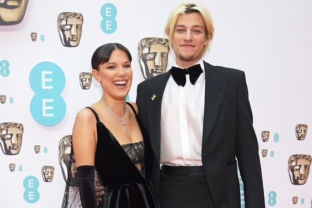 David M. Benett/Dave Benett/Getty Millie Bobby Brown and Jake Bongiovi attend the EE British Academy Film Awards 2022 at Royal Albert Hall on March 13, 2022