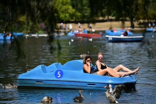 People cooled off on pedalos in London's Hyde Park