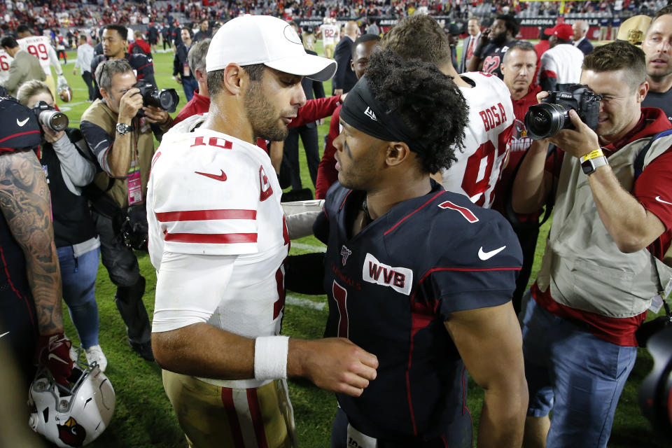 San Francisco 49ers quarterback Jimmy Garoppolo (10) greets Arizona Cardinals quarterback Kyler Murray (1) after an NFL football game, Thursday, Oct. 31, 2019, in Glendale, Ariz. The 49ers won 28-25. (AP Photo/Rick Scuteri)