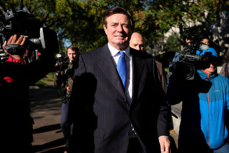 Former Trump 2016 campaign chairman Paul Manafort leaves U.S. Federal Court after being arraigned on twelve federal charges in the investigation into alleged Russian meddling in the 2016 U.S. presidential election in Washington, U.S. October 30, 2017. REUTERS/James Lawler Duggan