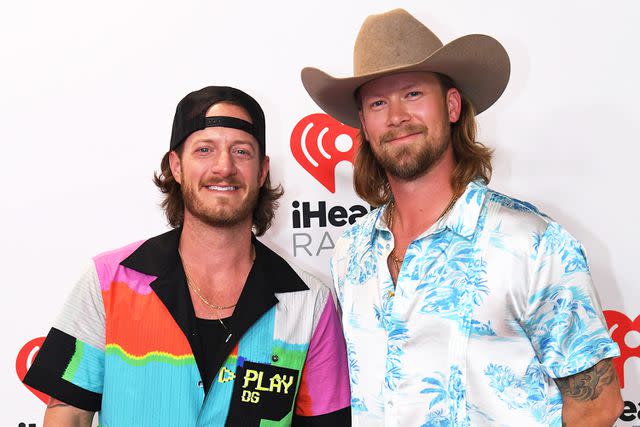 <p>Sam Morris/Getty</p> Tyler Hubbard and Brian Kelley of Florida Georgia Line in Las Vegas in September 2021