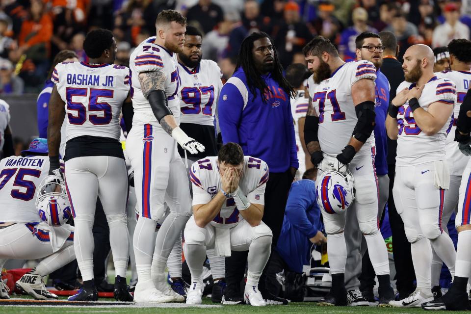 CINCINNATI, OHIO - JANUARY 02: Buffalo Bills players react after teammate Damar Hamlin #3 was injured against the Cincinnati Bengals during the first quarter at Paycor Stadium on January 02, 2023 in Cincinnati, Ohio. (Photo by Kirk Irwin/Getty Images)