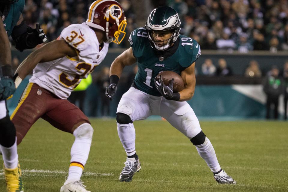 Eagles' Golden Tate (19) looks for room after a catch Monday night against the Redskins. 