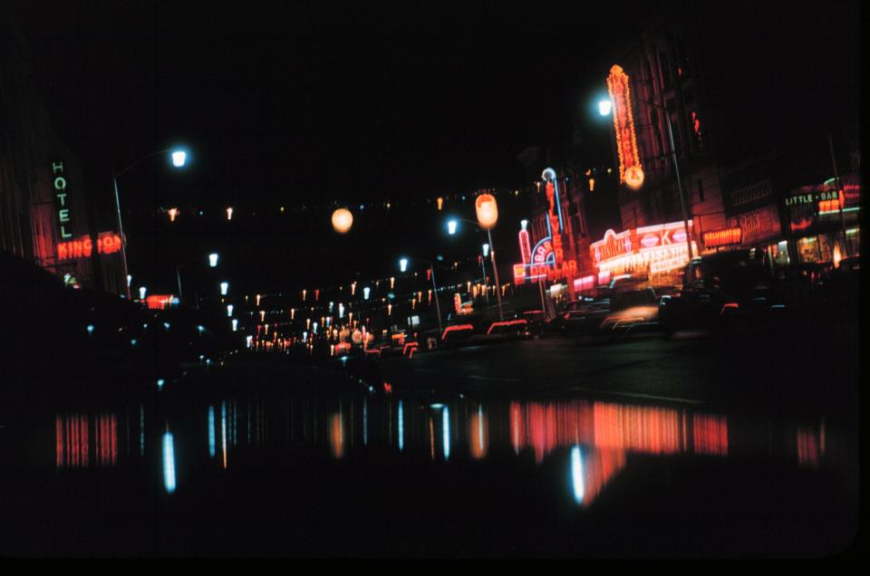 Second Street was dressed up for the holidays in this photo shot on Christmas Eve in 1954. Looking east down the street, landmarks include the Kingdon Hotel (left) and the Silver Dollar Bar, Kentucky Theater and Little Bar (right). The Kentucky Theater was housed in the Masonic building that is now the Citi Center Mall.