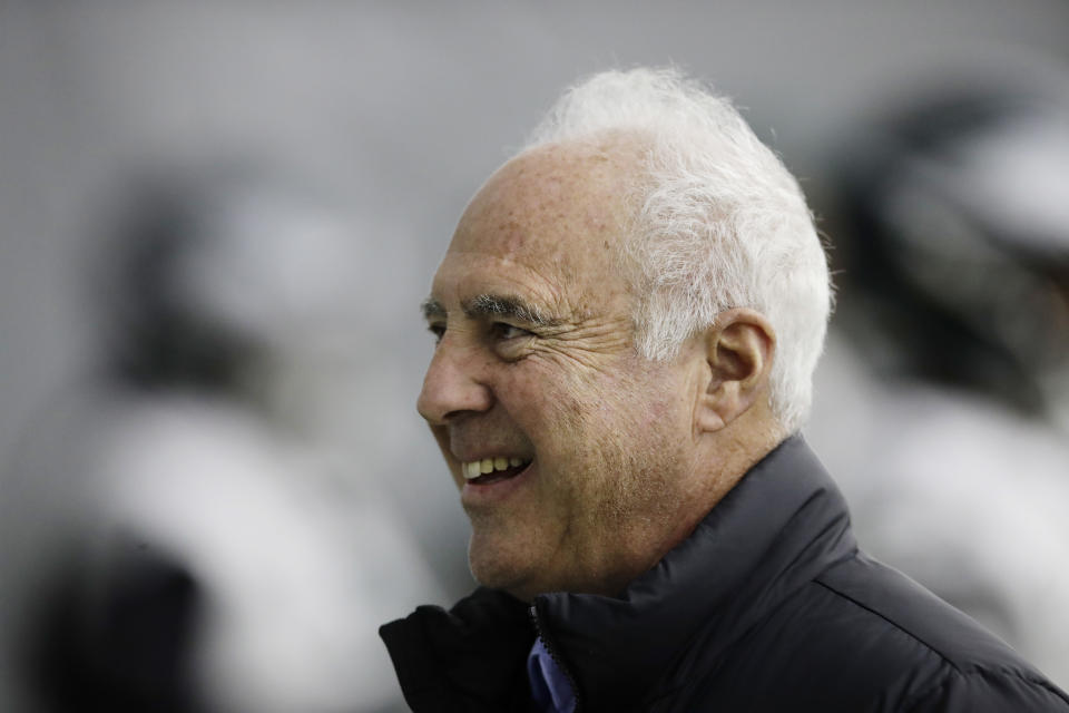 Philadelphia Eagles owner Jeffrey Lurie was partying in the locker room after his team’s win on Saturday. (AP)