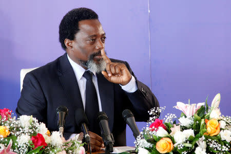 FILE PHOTO: Democratic Republic of Congo's President Joseph Kabila addresses a news conference at the State House in Kinshasa, Democratic Republic of Congo January 26, 2018. REUTERS/Kenny Katombe/File Photo