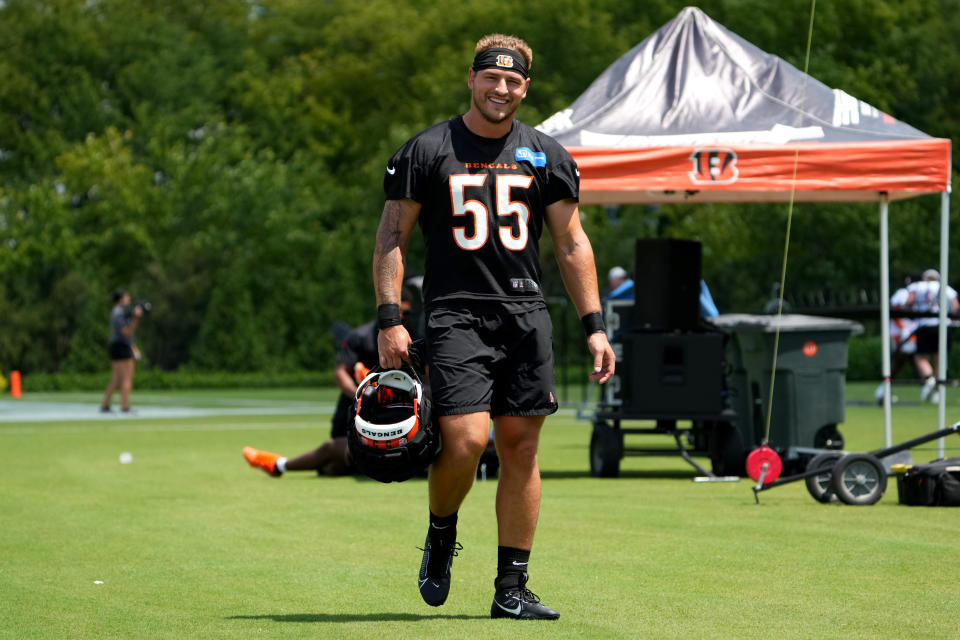 July 31, 2023; Cincinnati, OH, USA; Cincinnati Bengals linebacker Logan Wilson (55) smiles as he walks between drills during NFL training camp practice, Monday, July 31, 2023, in Cincinnati. Mandatory Credit: Kareem Elgazzar-USA TODAY Sports